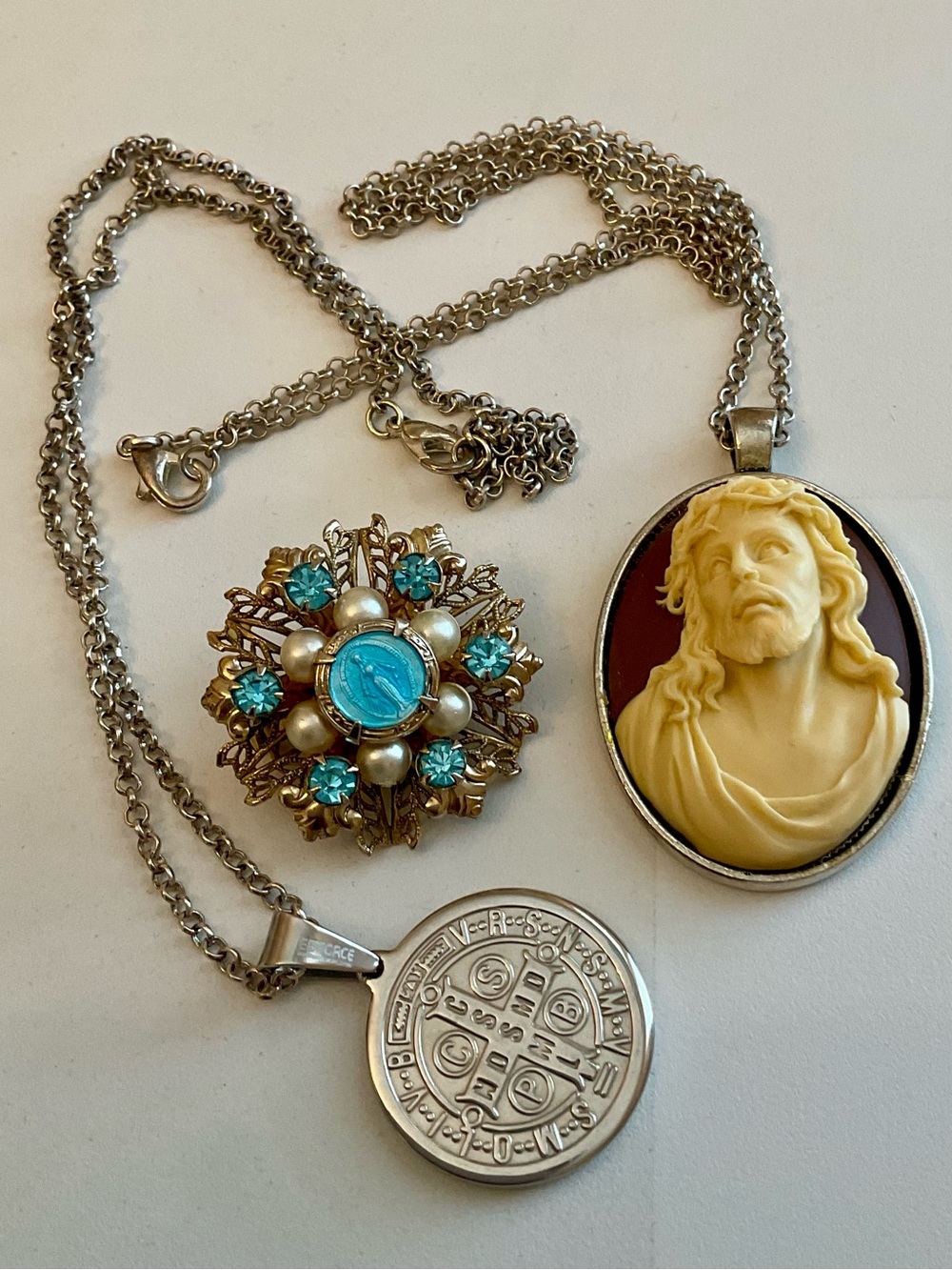 Vintage set of religious symbols and items, Jesus cameo, st. Patrick , and Mary